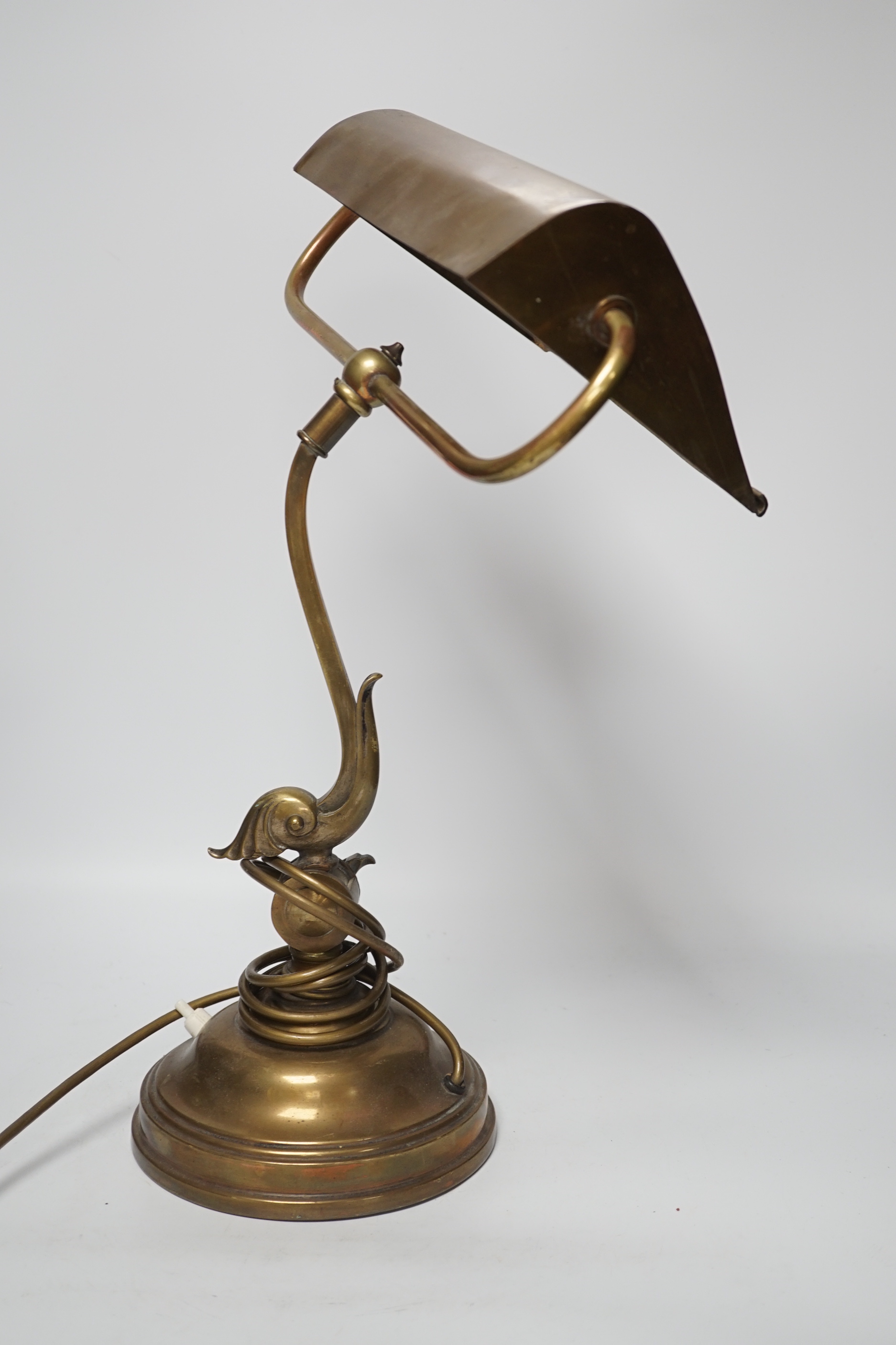 An early 20th century brass desk lamp, 45cm high